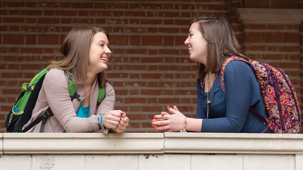 two female students having a conversation